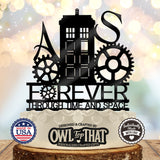 Black police call box wedding cake topper with initials A and S, decorative gears, and Forever Through Time and Space lettering.