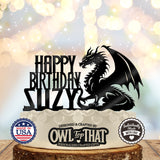 Black dragon birthday cake topper with a horned dragon, raised wing, curled tail, Happy Birthday lettering, and personalized name SUZY.