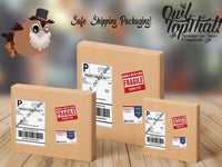 three boxes with shipping labels on them on a wooden table