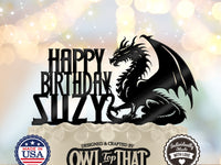 Black dragon birthday cake topper with a horned dragon, raised wing, curled tail, Happy Birthday lettering, and personalized name SUZY.