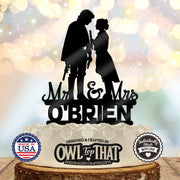 Black Han and Leia wedding cake topper featuring the couple facing each other above Mr & Mrs lettering and the personalized surname O’Brien.