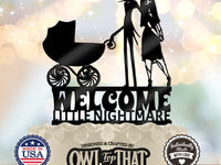 Black Jack and Sally gothic baby shower cake topper beside a vintage-style baby carriage above the words Welcome Little Nightmare.