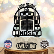 Black semi truck birthday cake topper with a front-facing big rig, arched Happy Birthday lettering, age 55, and the personalized name Lindsey across the bumper.