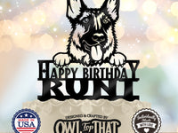 Black German Shepherd birthday cake topper with upright ears, tongue out, paws above Happy Birthday lettering, and the personalized name RUNT.
