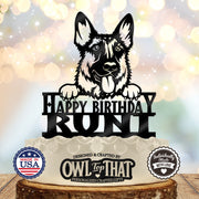 Black German Shepherd birthday cake topper with upright ears, tongue out, paws above Happy Birthday lettering, and the personalized name RUNT.